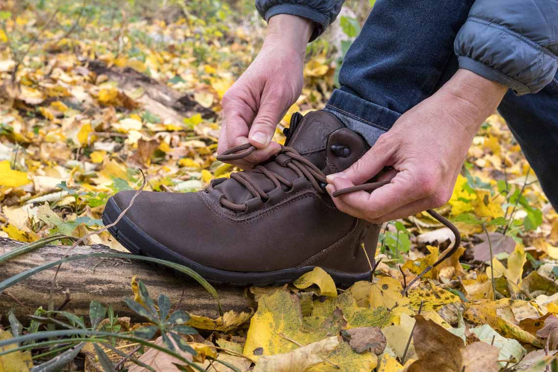 Hnědé barefoot outdoor boty od značky Freet Ibex obuté